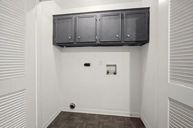 a view of cabinets and window