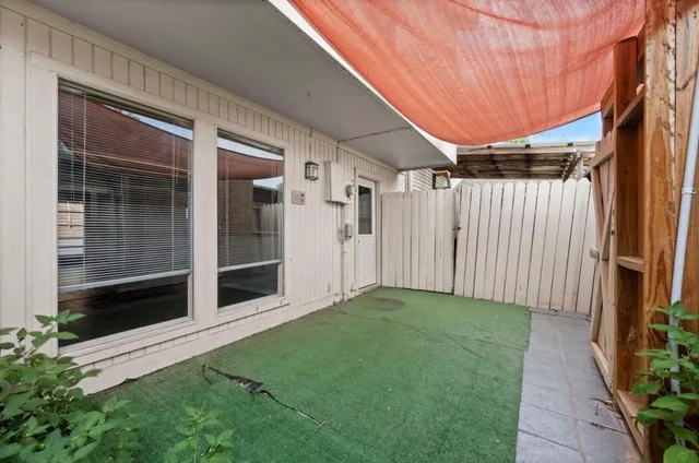 a view of a backyard with garden