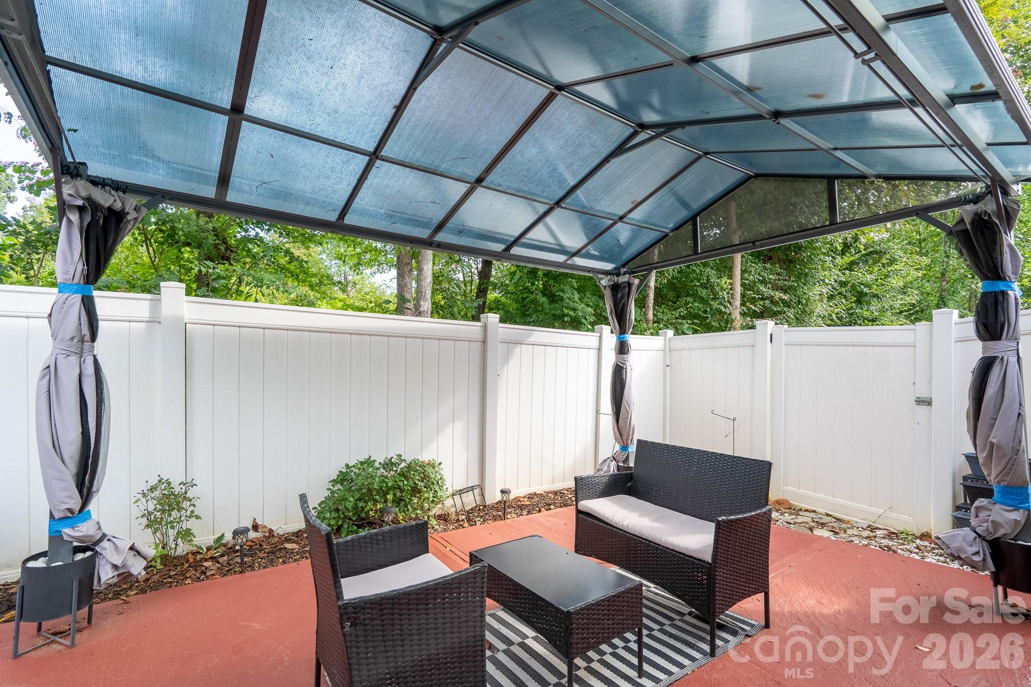 1219 Amberlight Circle Salisbury, NC 28144 - Photo 29 of 30 a backyard of a house with yard and outdoor seating