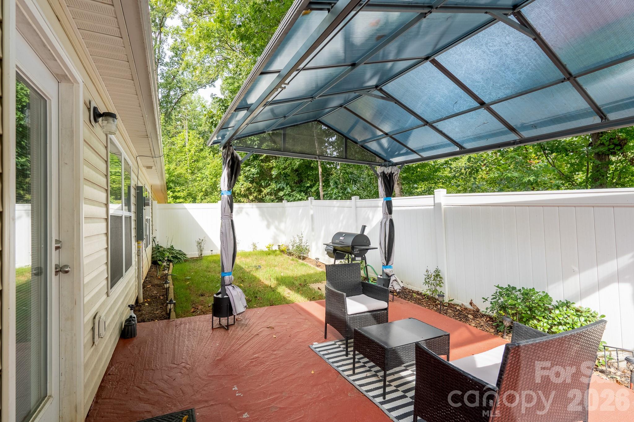 1219 Amberlight Circle Salisbury, NC 28144 - Photo 30 of 30 a backyard of a house with seating space