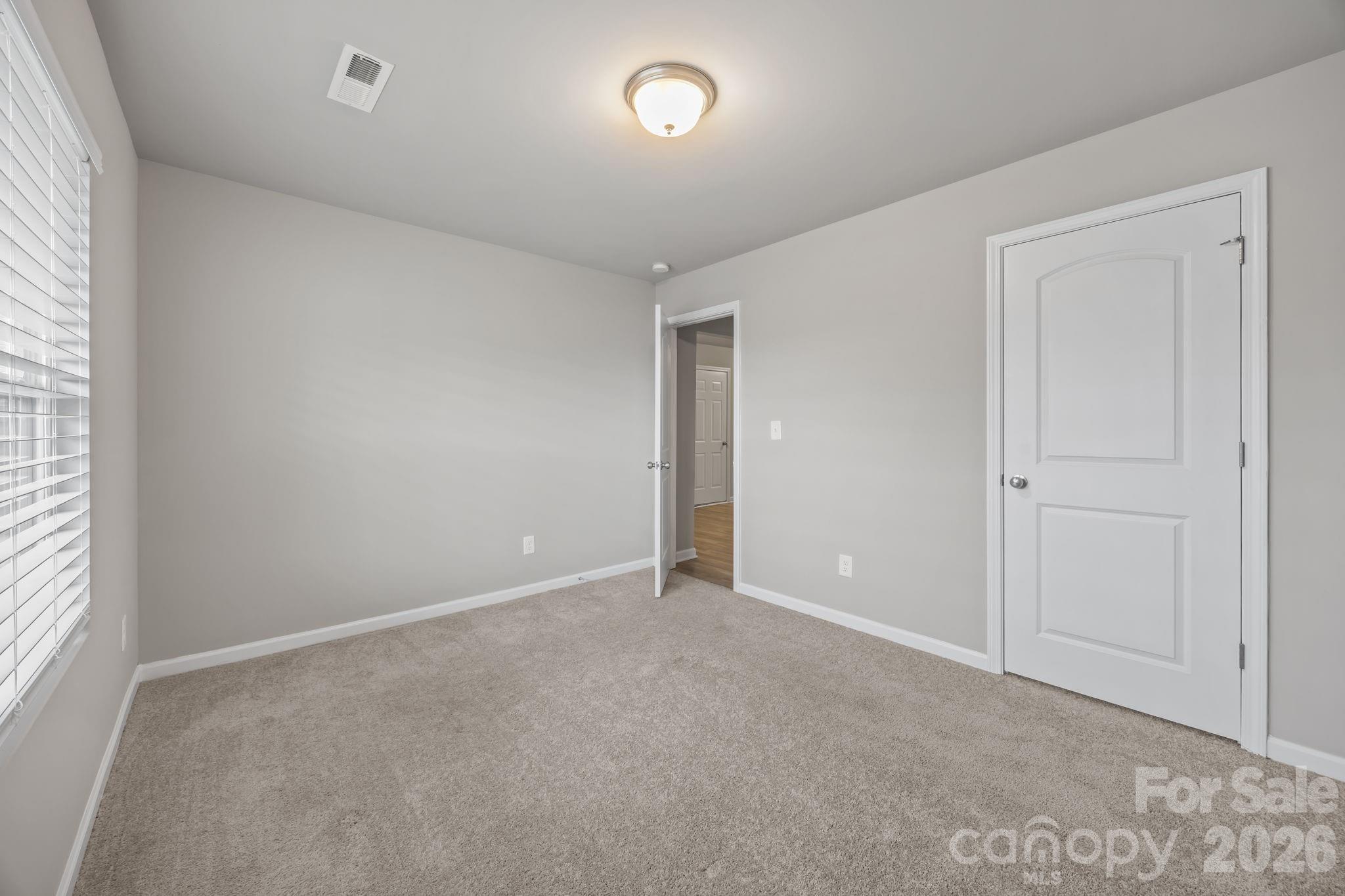 1219 Amberlight Circle Salisbury, NC 28144 - Photo 6 of 30 an empty room with fan
