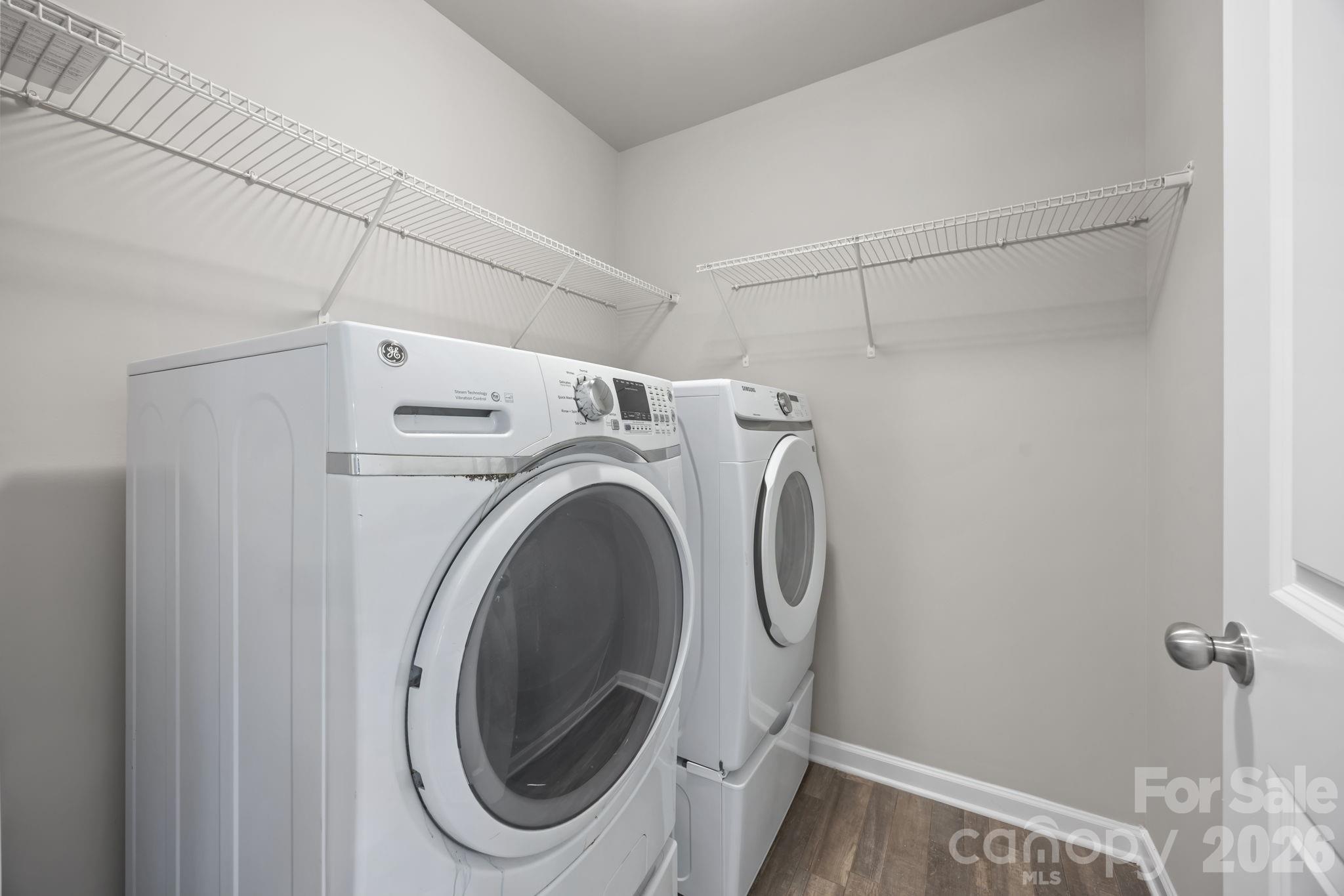 1219 Amberlight Circle Salisbury, NC 28144 - Photo 9 of 30 a utility room with dryer and washer