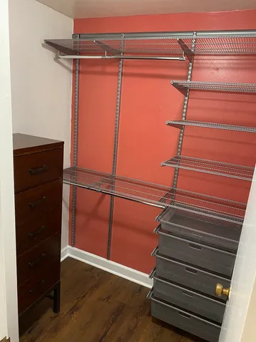 a view of a room with racks on the wall