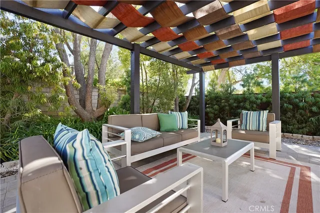 a outdoor living space with furniture and garden view