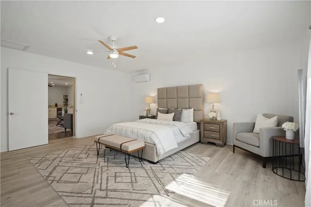 a bed room with a bed and a couch