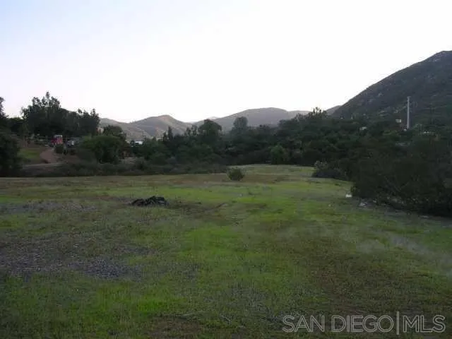 a view of an outdoor space and a yard