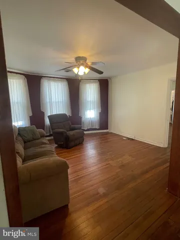 a kitchen with a stove and a refrigerator