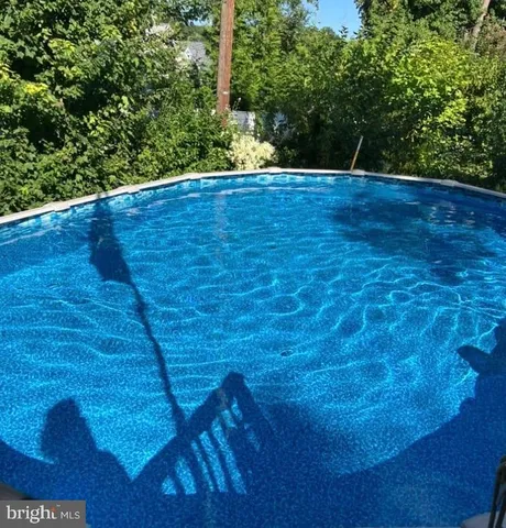 a view of a yard with an outdoor space