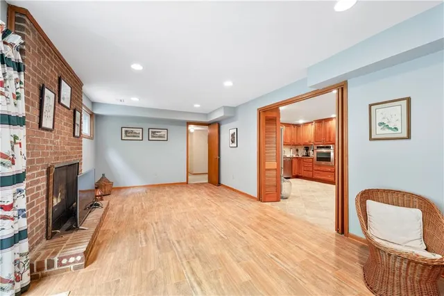 a kitchen with granite countertop a stove a microwave and cabinets