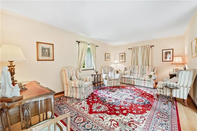 a living room with furniture and a table