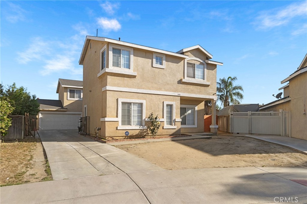 1494 Rabbit Peak Way Hemet, CA 92545 - Photo 43 of 45 a front view of a house with a yard