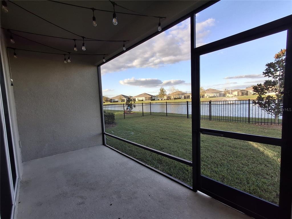 7891 Stonebrook Circle Wesley Chapel, FL 33545 - Photo 14 of 39 a view of a floor to ceiling window