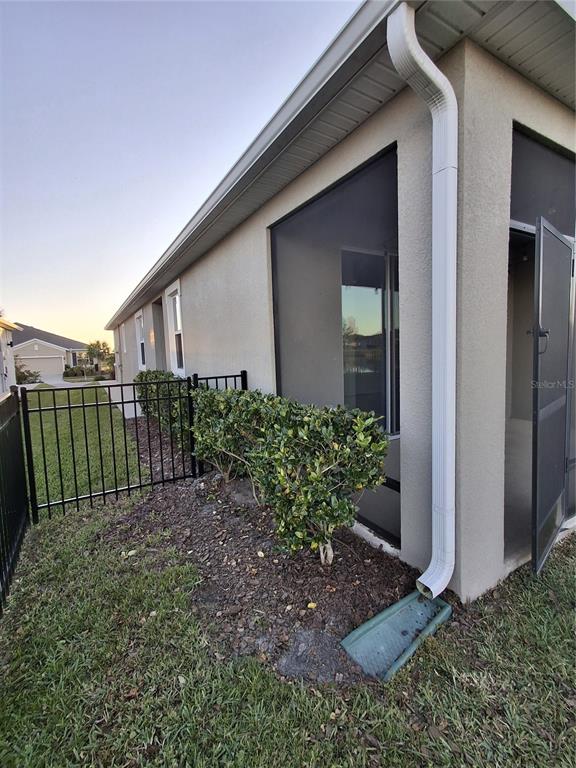 7891 Stonebrook Circle Wesley Chapel, FL 33545 - Photo 7 of 39 a view of a backyard