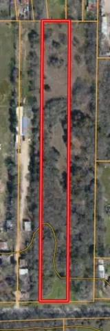 a yellow building with red red sign