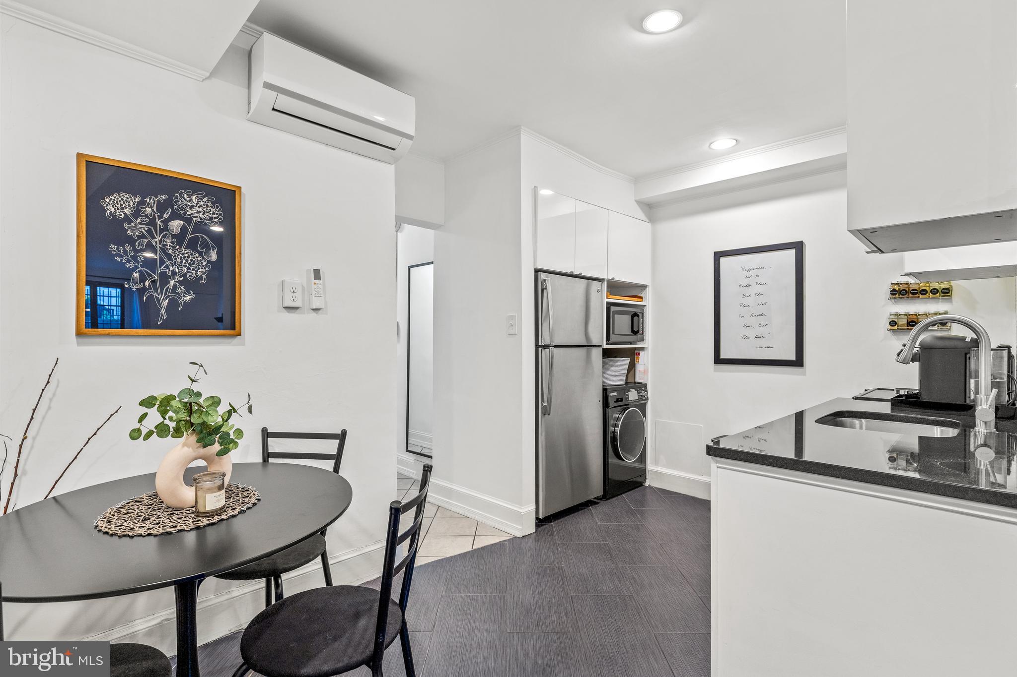 1213 29th Street Northwest Washington, DC 20007 - Photo 23 of 31 a view of a dining room with furniture