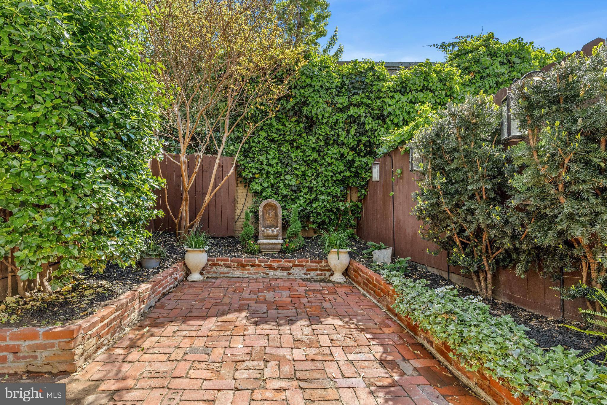 1213 29th Street Northwest Washington, DC 20007 - Photo 30 of 31 a pathway of a house with a yard