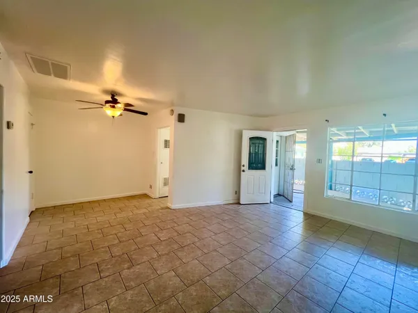 a view of a livingroom with a staircase