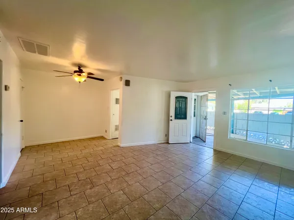 a view of a livingroom with a staircase
