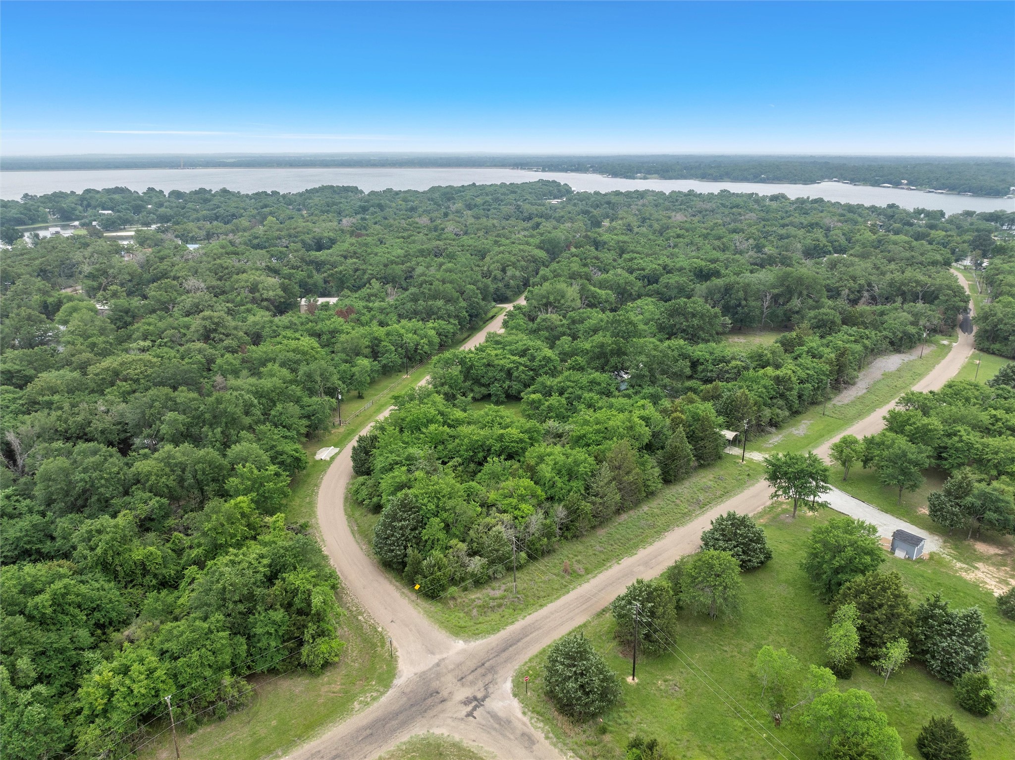 Lot 1 Post Oak Loop Thornton, TX 76687 - Photo 4 of 11 an aerial view of a residential houses with outdoor space and trees