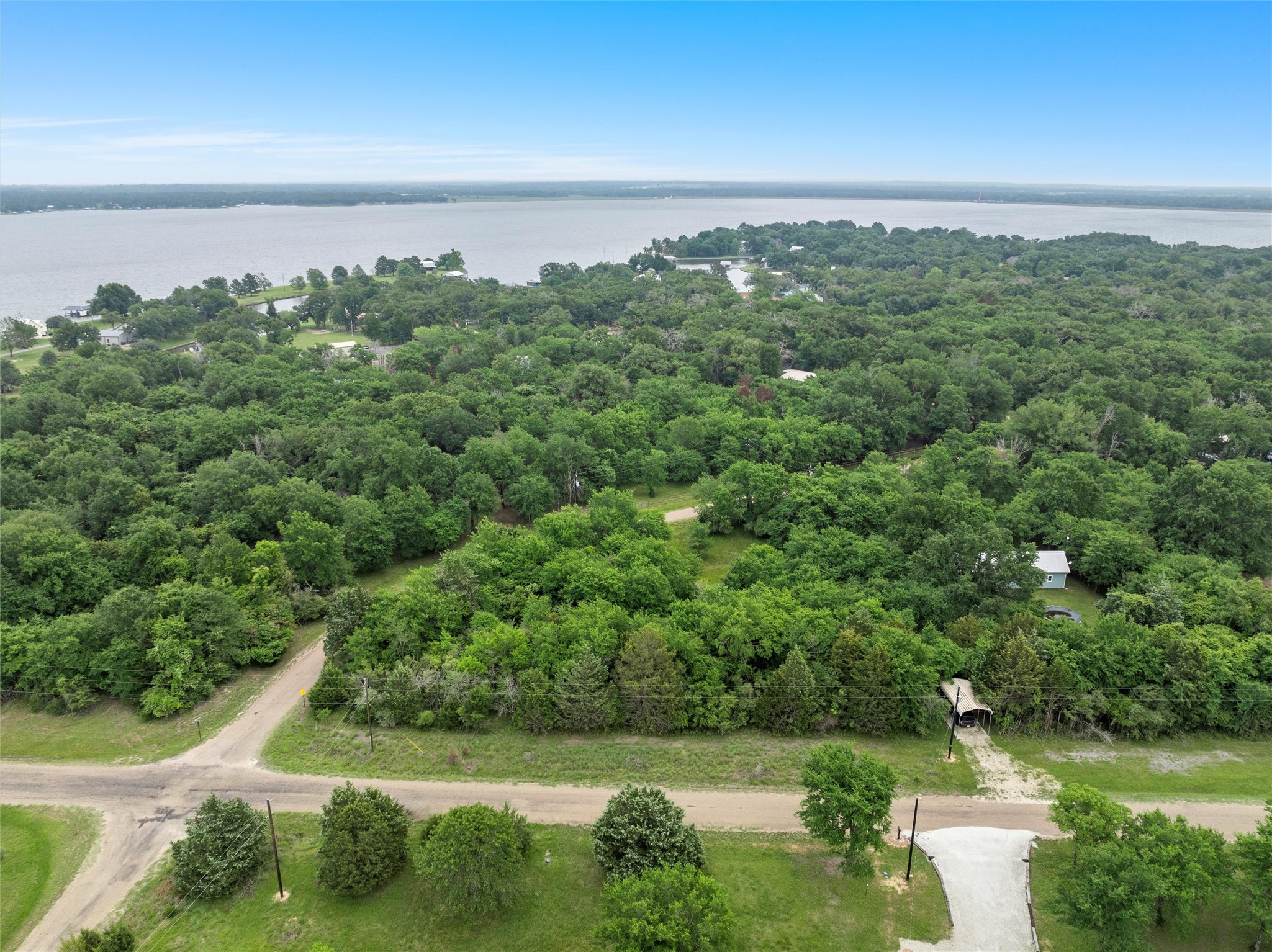 Lot 1 Post Oak Loop Thornton, TX 76687 - Photo 5 of 11 a view of a city with lush green forest