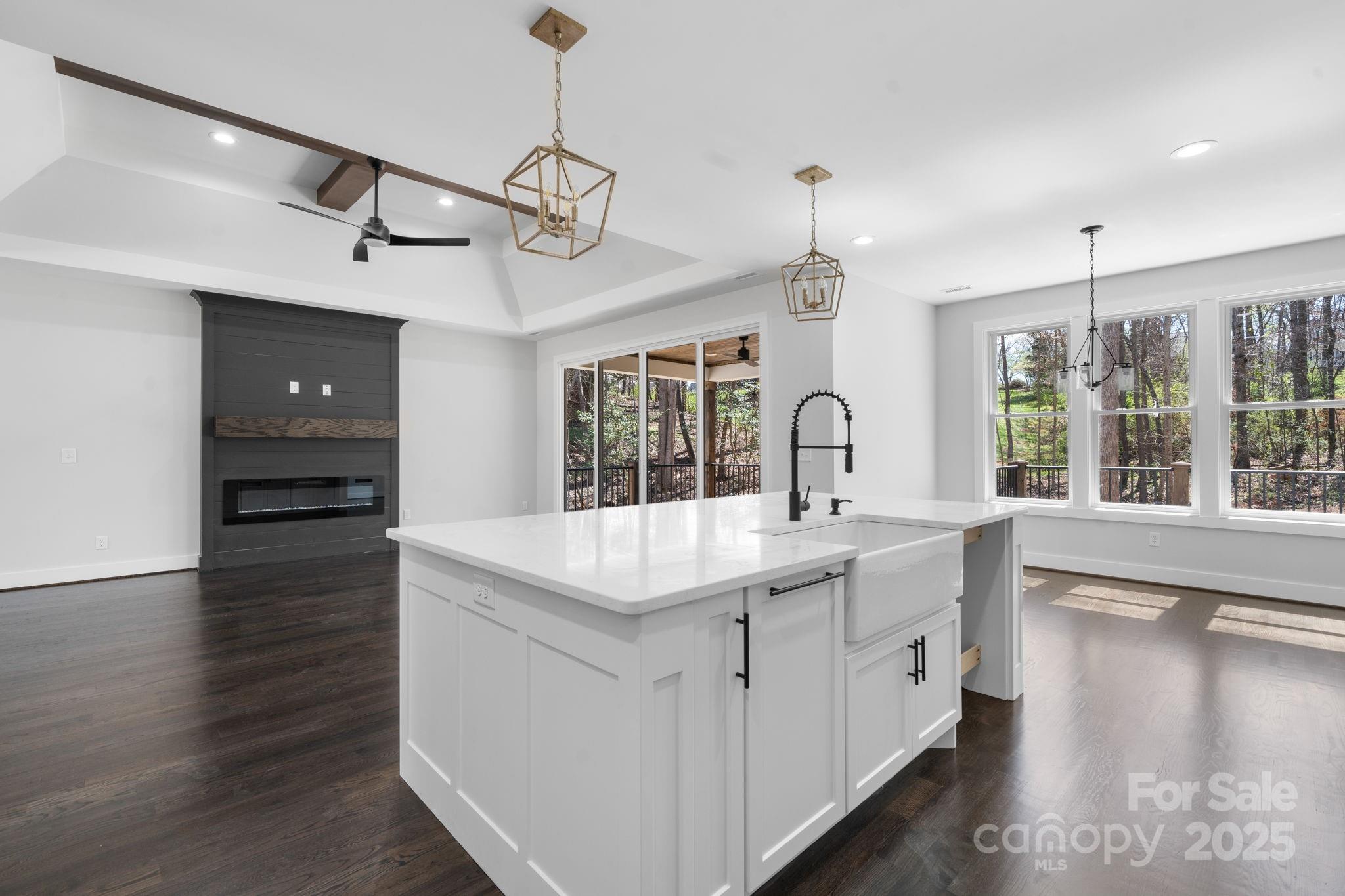3732 Whitney Drive Northeast Hickory, NC 28601 - Photo 15 of 48 a kitchen with a sink and wooden floor