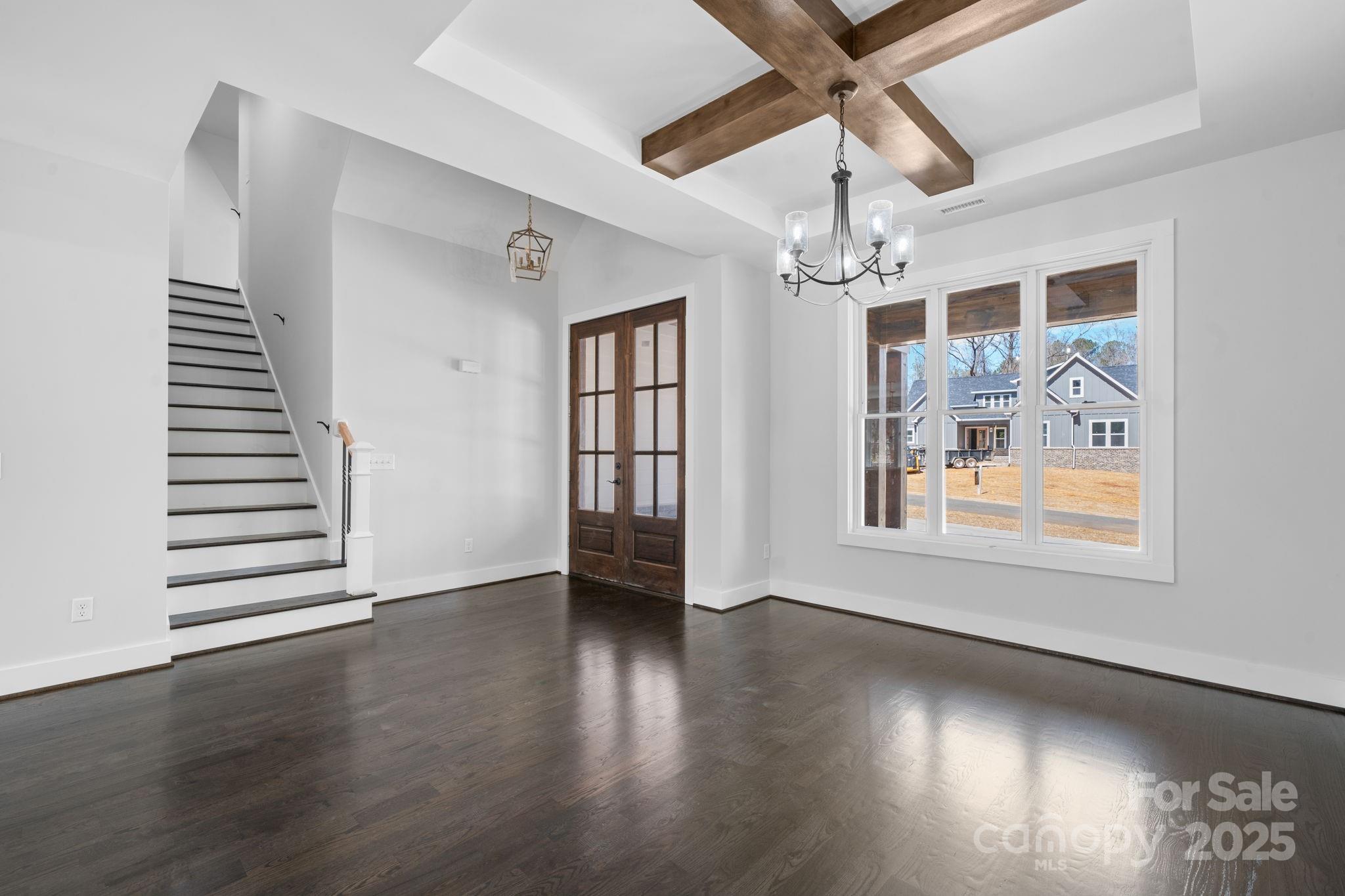 3732 Whitney Drive Northeast Hickory, NC 28601 - Photo 19 of 48 a view of an empty room with wooden floor and a window