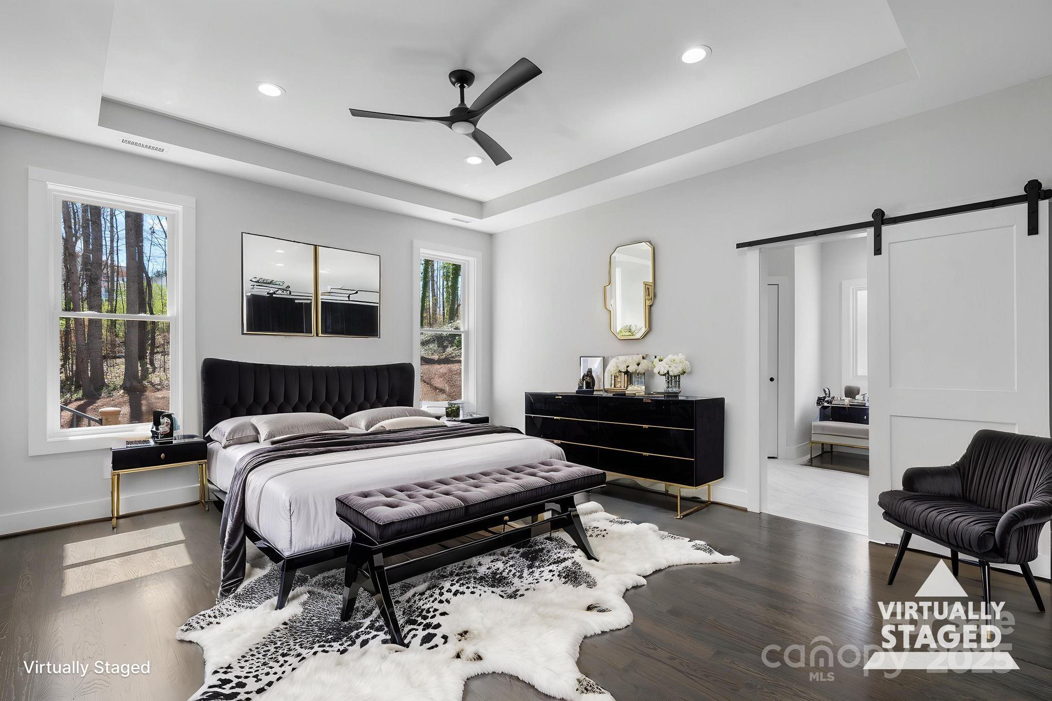 3732 Whitney Drive Northeast Hickory, NC 28601 - Photo 26 of 48 a bedroom with a bed and wooden floor