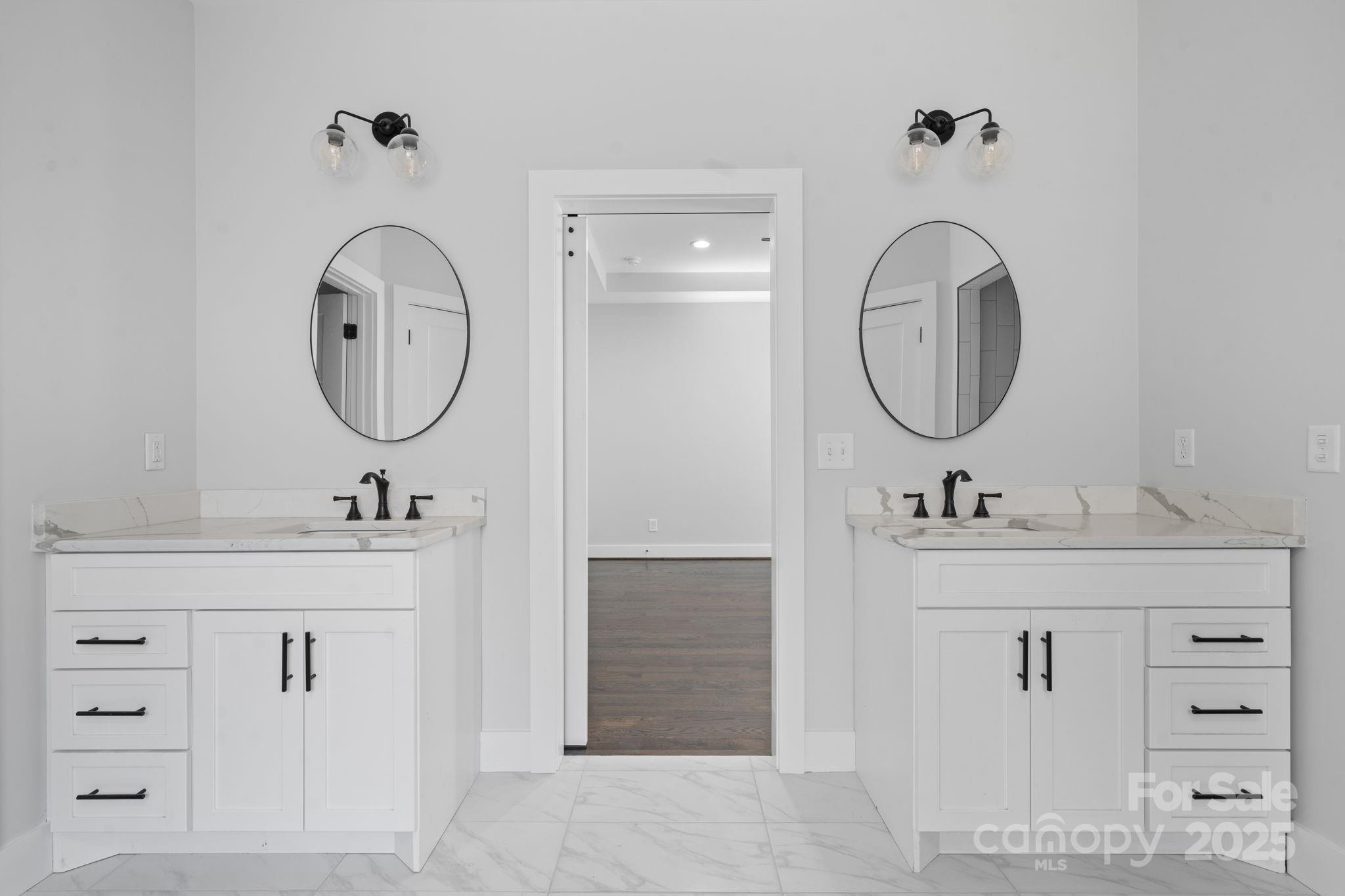 3732 Whitney Drive Northeast Hickory, NC 28601 - Photo 27 of 48 a bathroom with a sink and a mirror