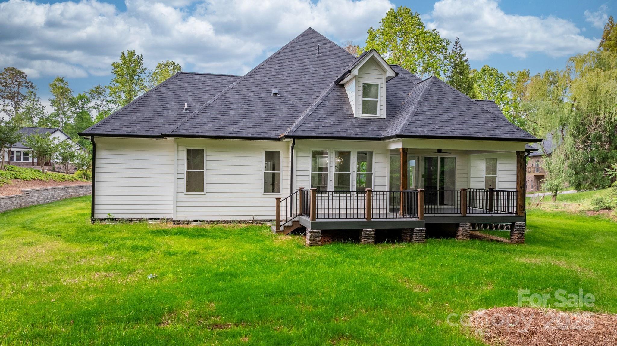 3732 Whitney Drive Northeast Hickory, NC 28601 - Photo 9 of 48 a view of a house with a garden and plants