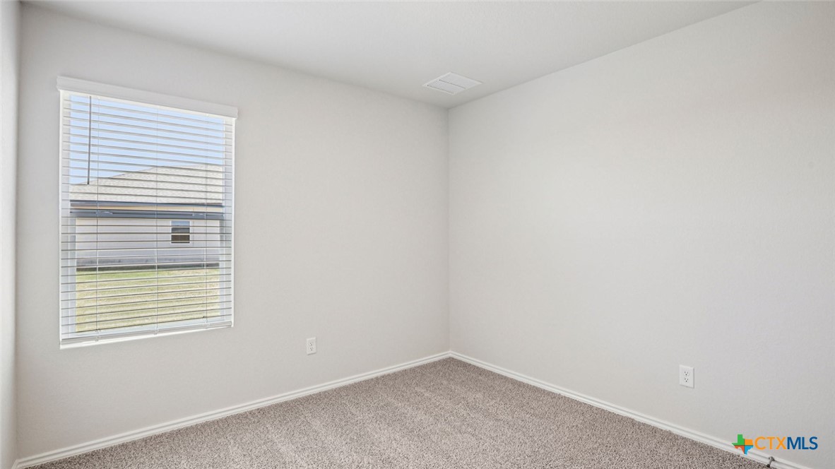 1303 Newey Circle Temple, TX 76504 - Photo 27 of 33 a view of an empty room with a window
