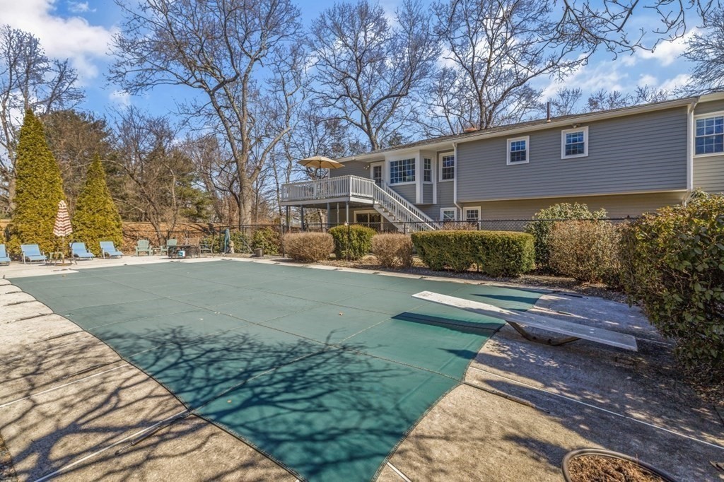 3 Bacon Road Framingham, MA 01701 - Photo 33 of 42 a front view of a house with a yard and trees
