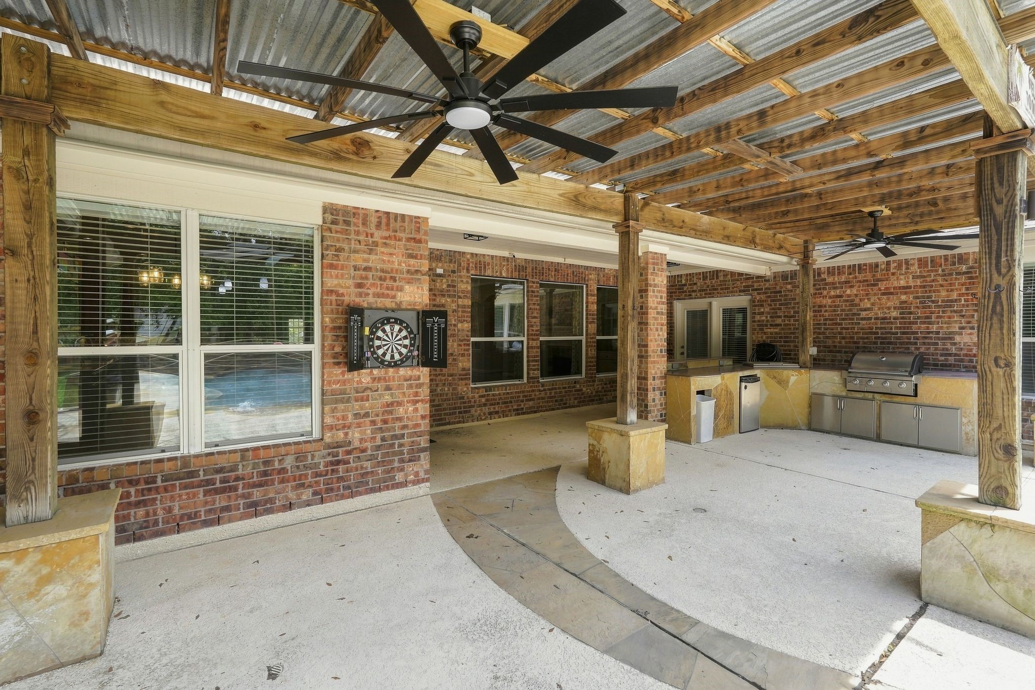 30307 Aldine Westfield Road Spring, TX 77386 - Photo 38 of 46 Expansive Patio with an outdoor kitchen for great pool parties!