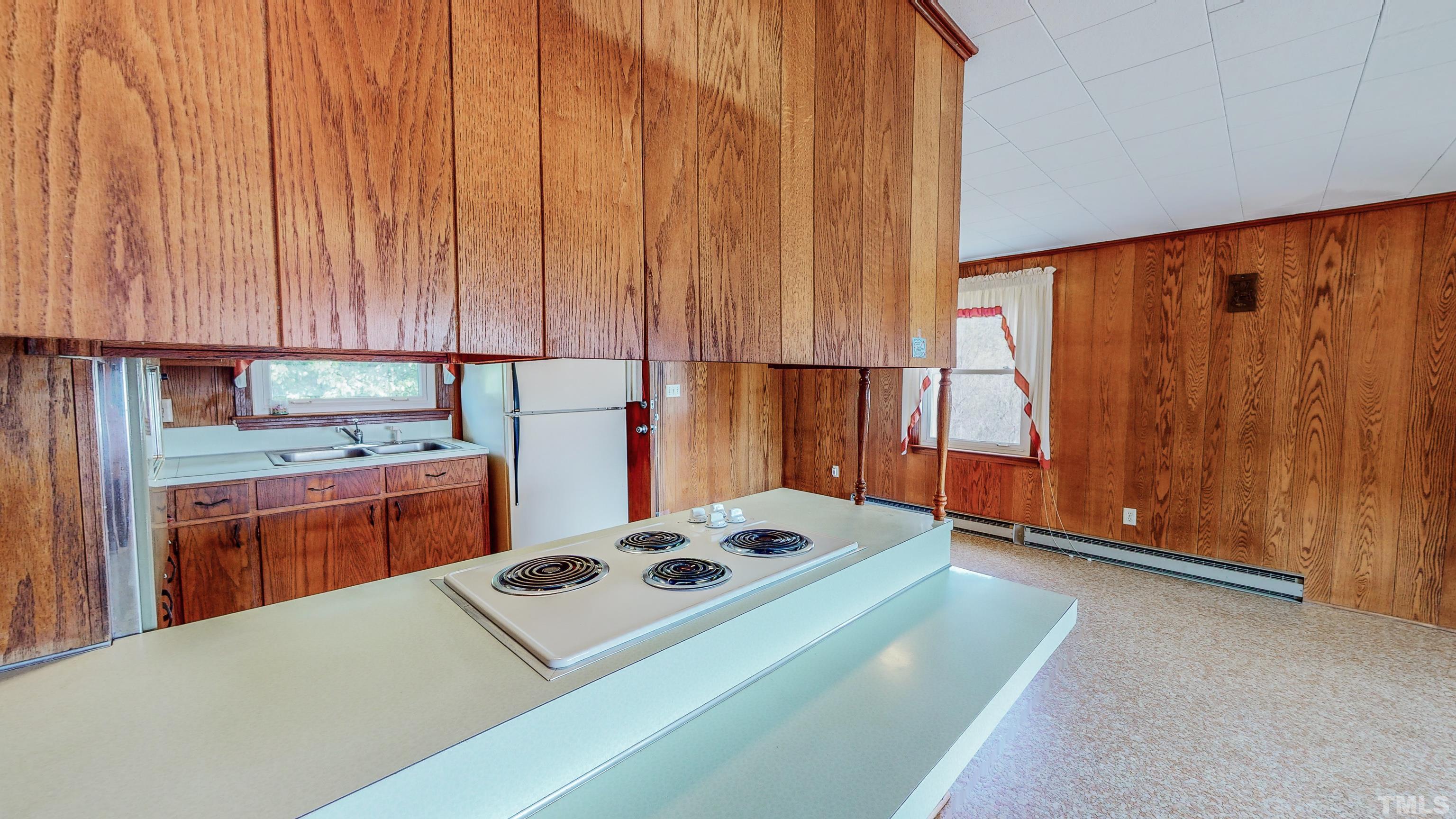 9639 Boston Road Roxboro, NC 27574 - Photo 15 of 52 a bedroom with a bed and a cabinets