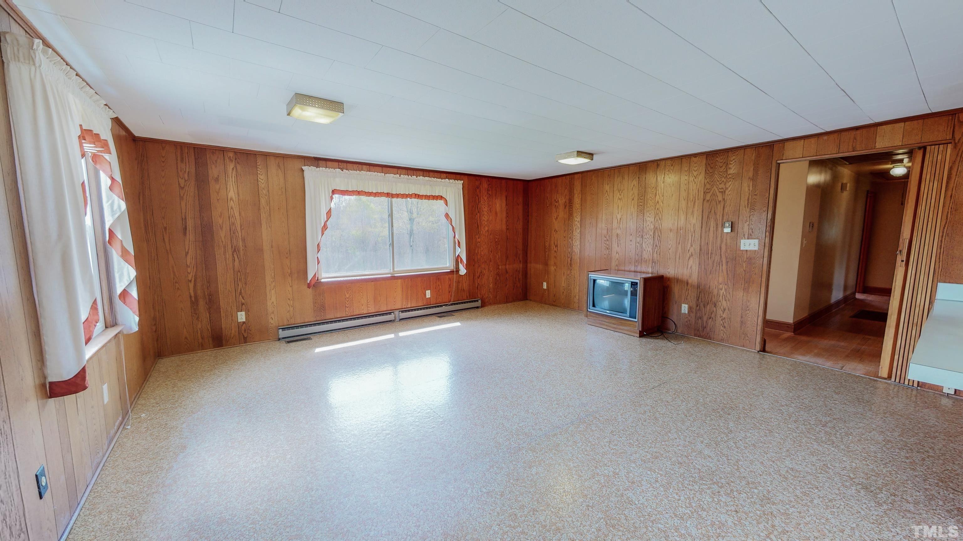 9639 Boston Road Roxboro, NC 27574 - Photo 16 of 52 an empty room with windows