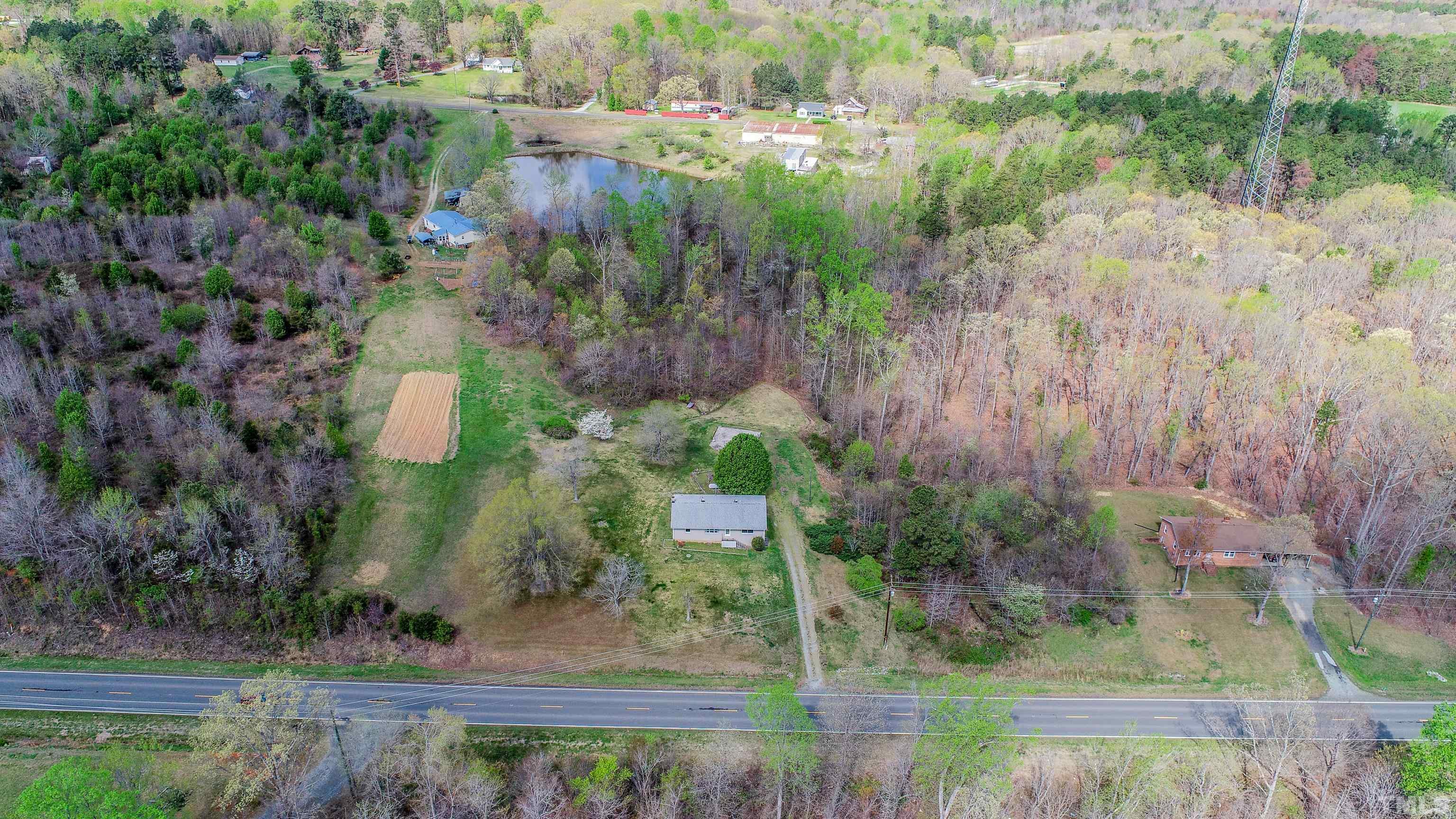 9639 Boston Road Roxboro, NC 27574 - Photo 27 of 52 a view of backyard with green space