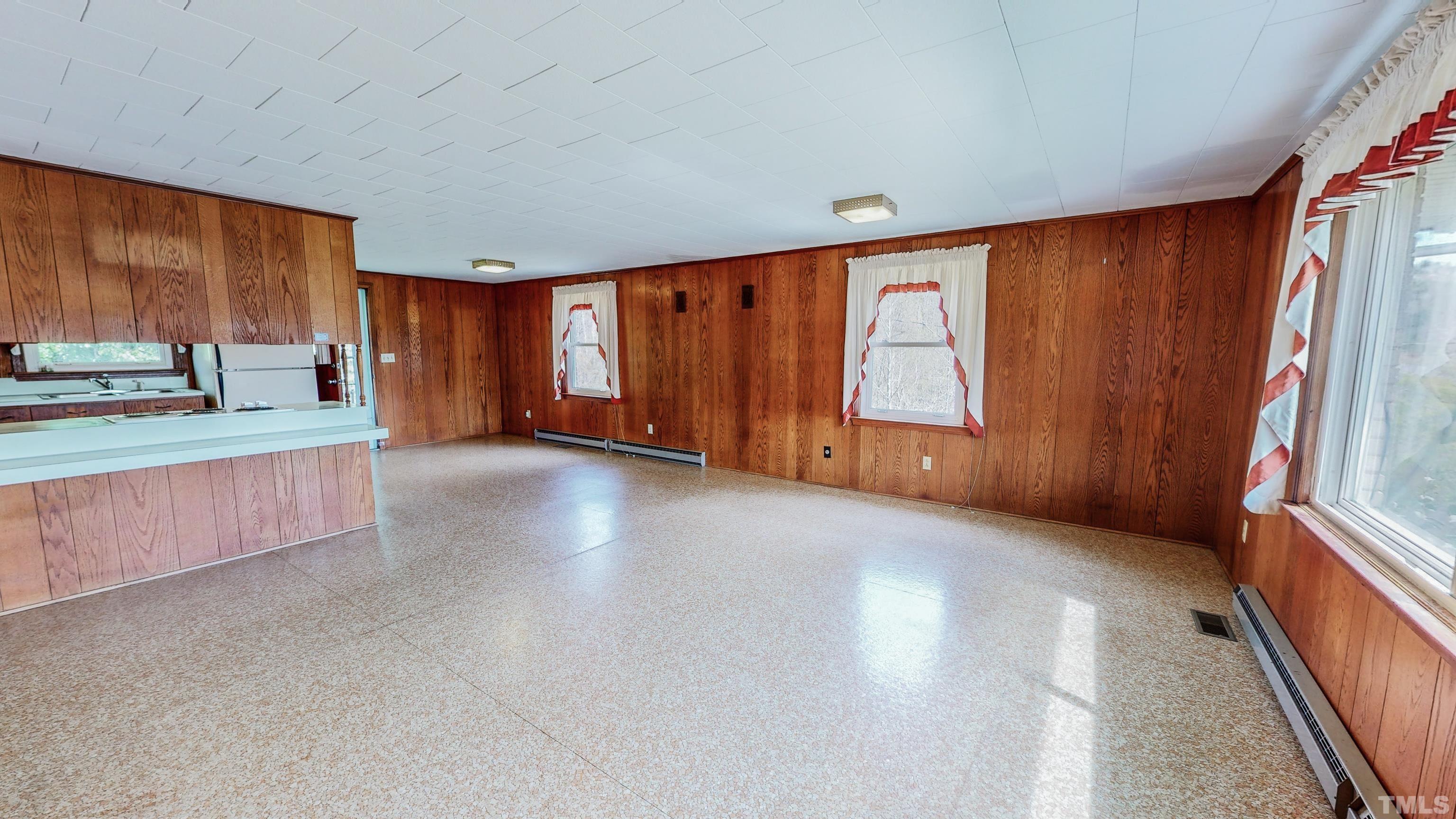 9639 Boston Road Roxboro, NC 27574 - Photo 4 of 52 a view of an empty room with a window