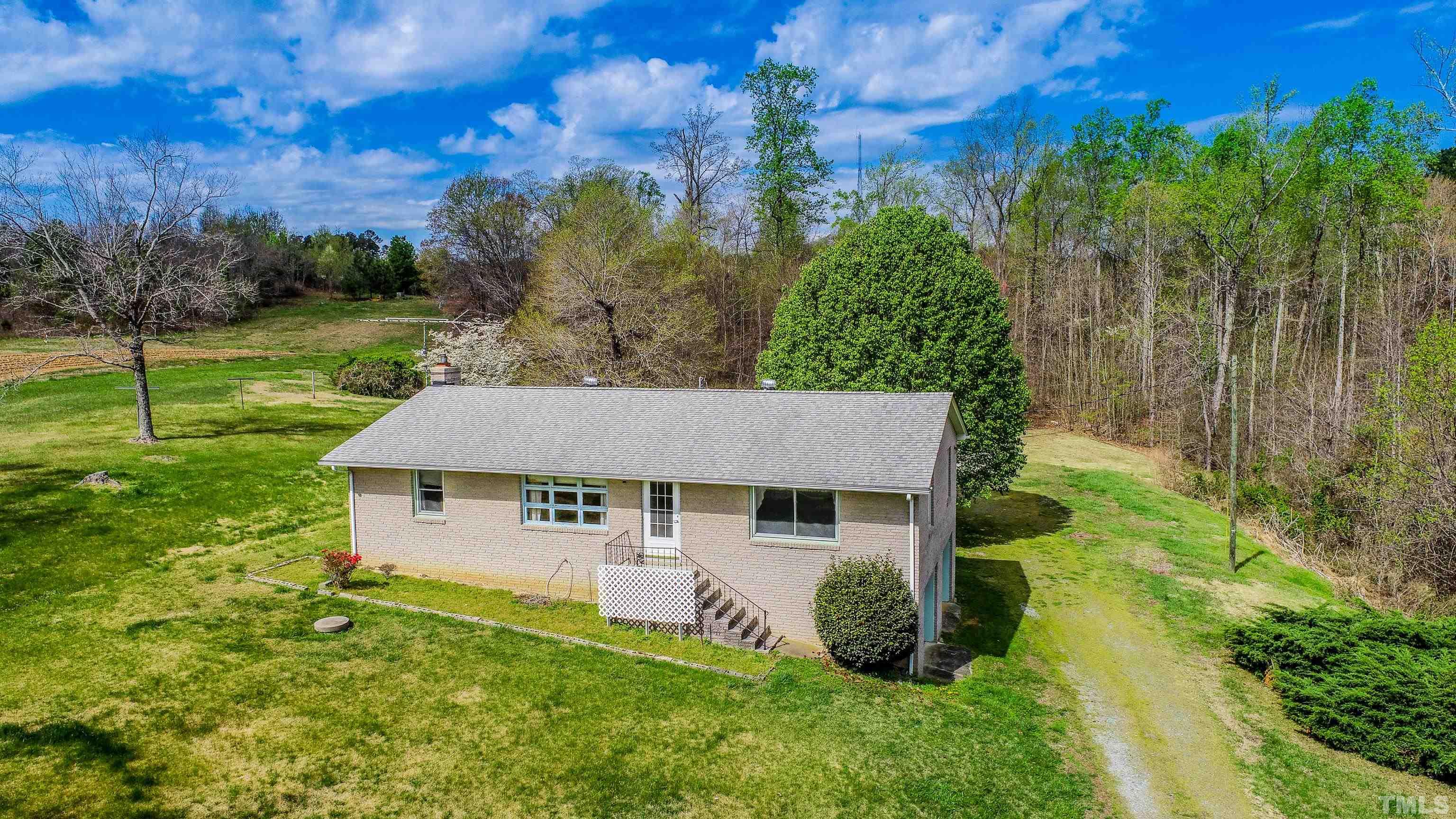 9639 Boston Road Roxboro, NC 27574 - Photo 41 of 52 front view of a house with a yard