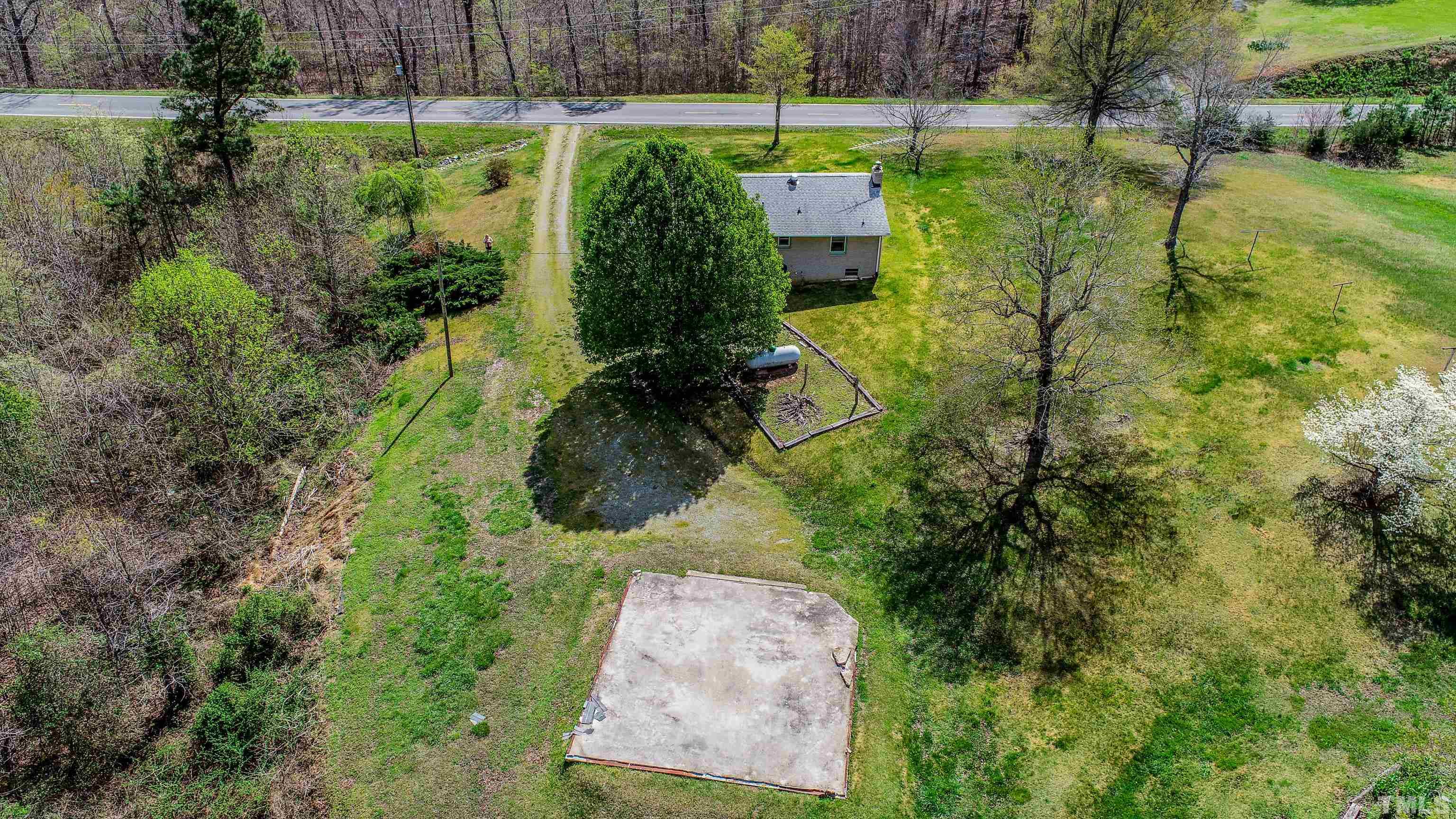 9639 Boston Road Roxboro, NC 27574 - Photo 47 of 52 a view of a park with large trees
