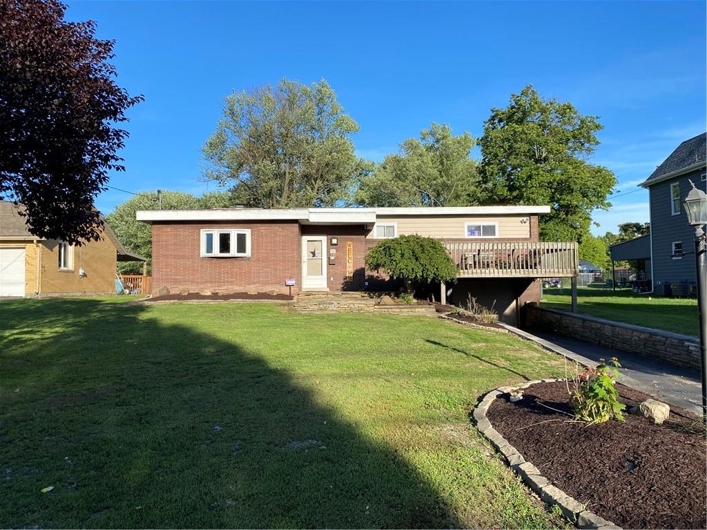 a house view with a garden space