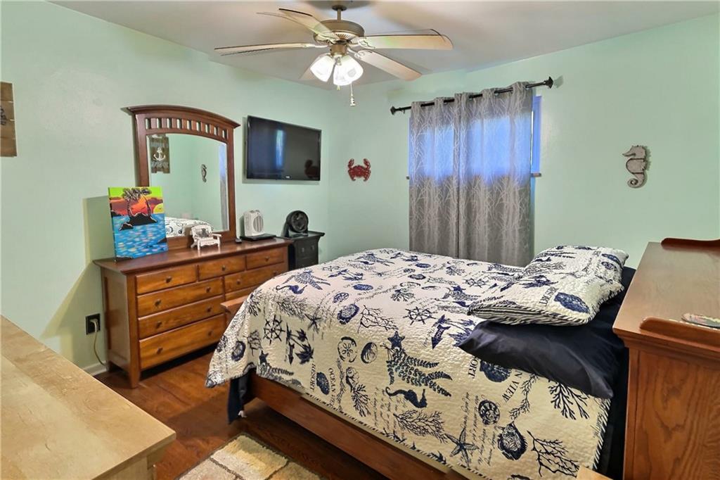 717 Morgantown Road Uniontown, PA 15401 - Photo 11 of 18 a bedroom with a bed and a dresser