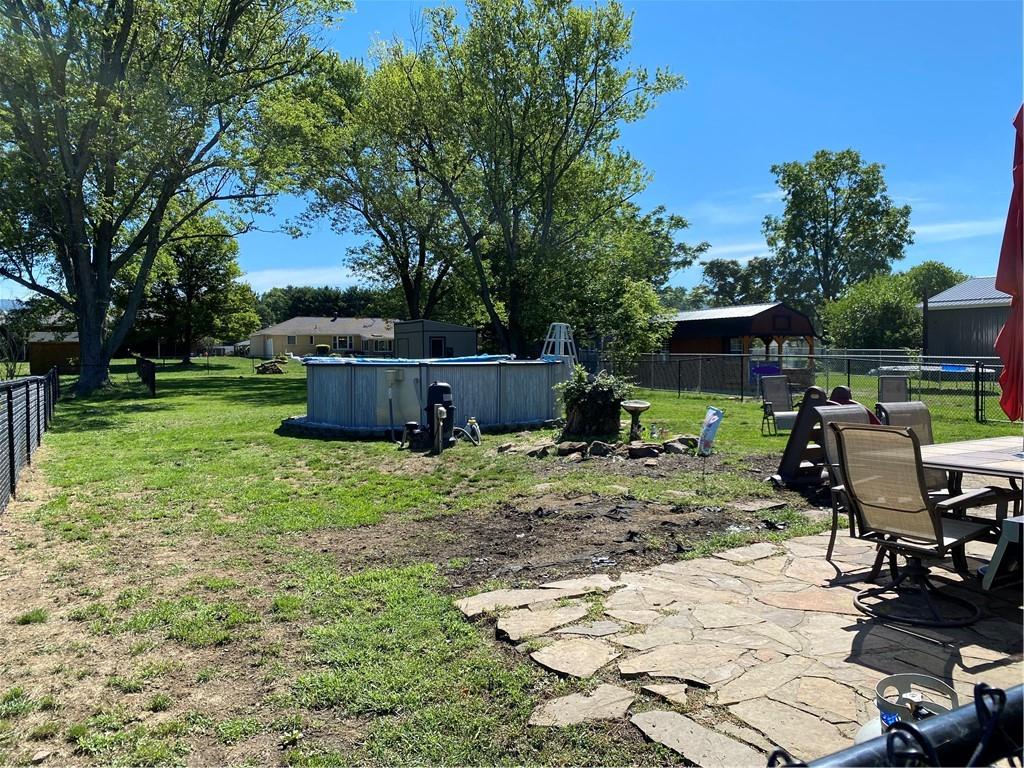 717 Morgantown Road Uniontown, PA 15401 - Photo 14 of 18 a view of a backyard with sitting area
