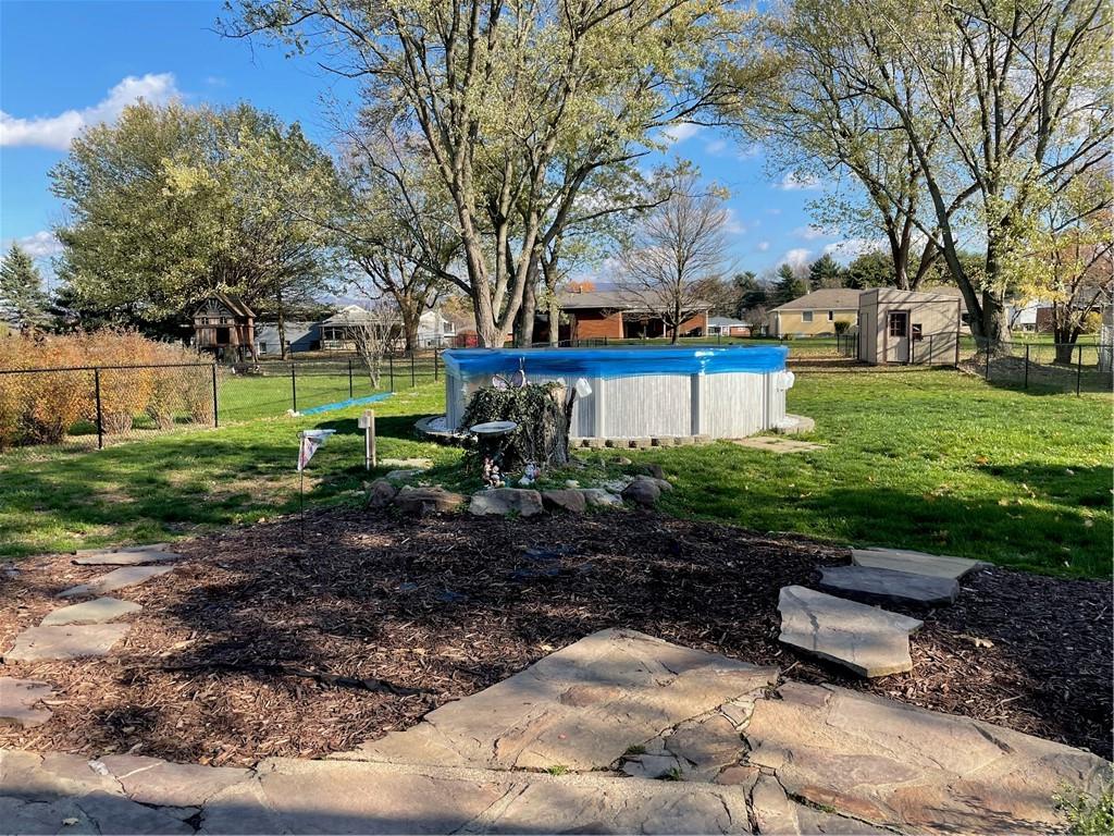 717 Morgantown Road Uniontown, PA 15401 - Photo 15 of 18 a front view of a house with garden