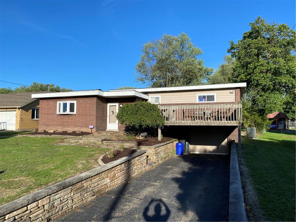 717 Morgantown Road Uniontown, PA 15401 - Photo 18 of 18 a view of a house with a roof deck