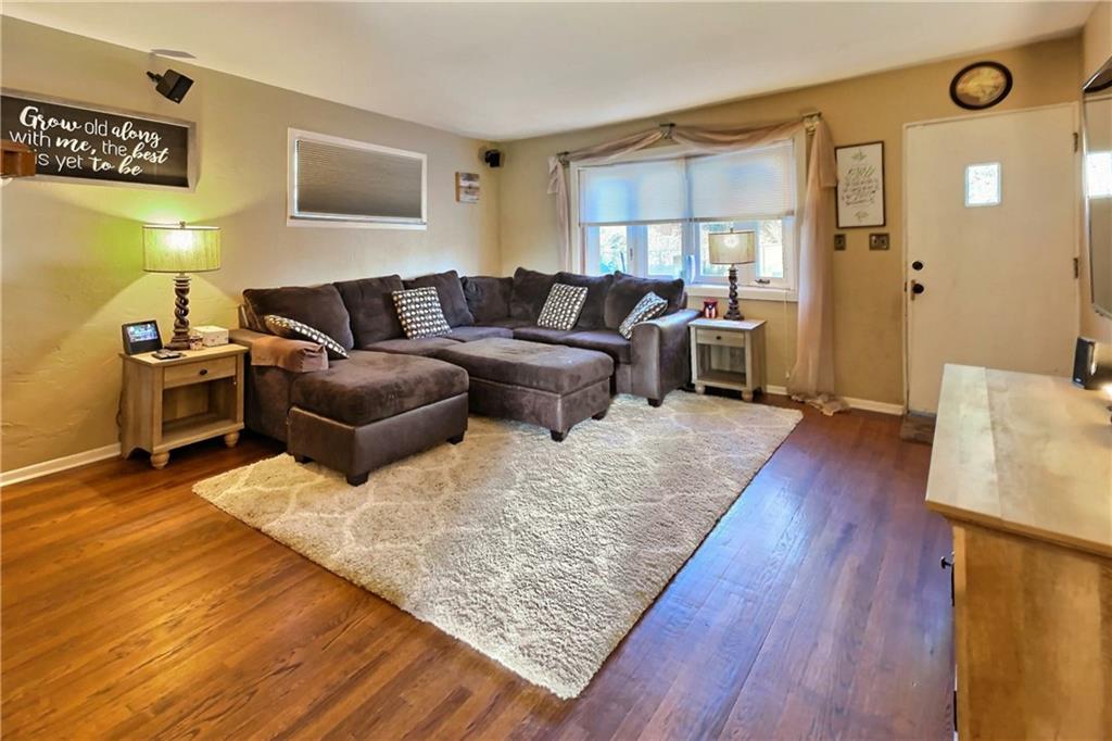 717 Morgantown Road Uniontown, PA 15401 - Photo 3 of 18 a living room with furniture and wooden floor