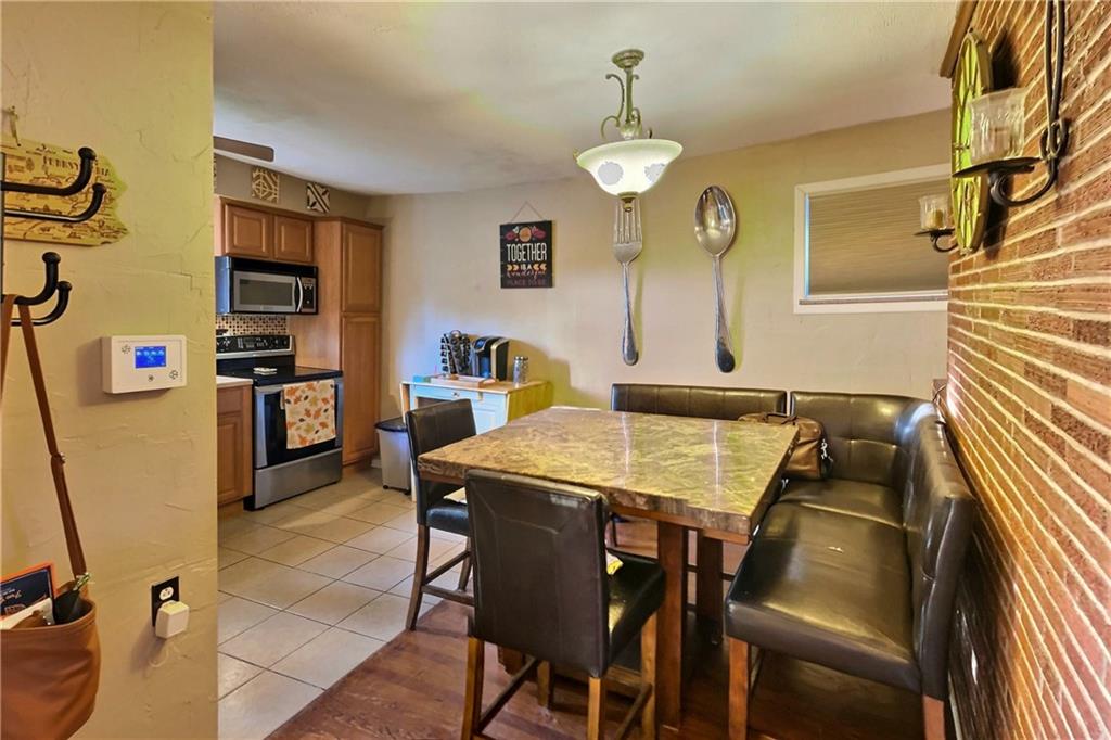 717 Morgantown Road Uniontown, PA 15401 - Photo 6 of 18 a view of a dining room with furniture and window