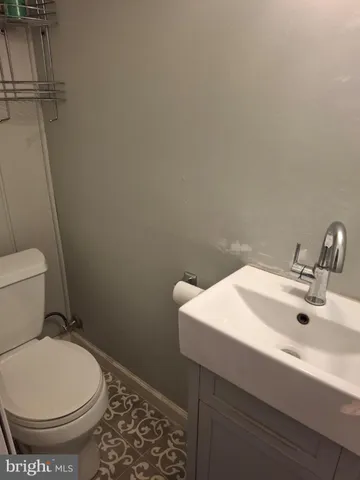 a bathroom with a sink and a toilet