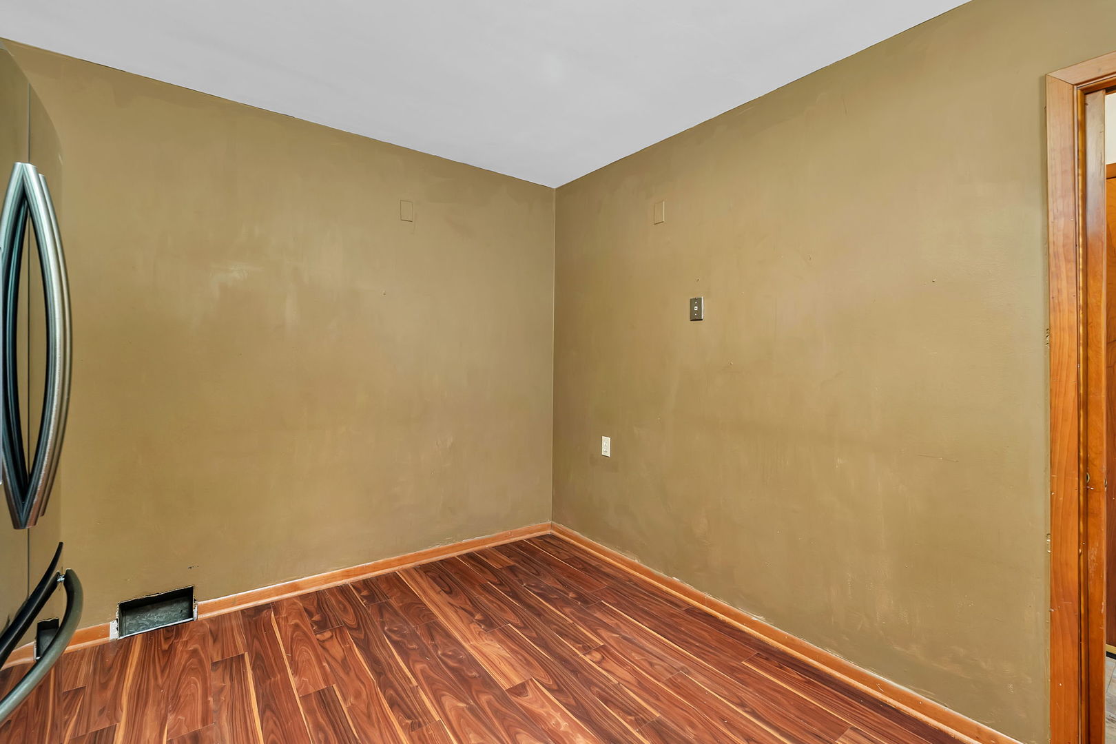 536 Fort Street Ottawa, IL 61350 - Photo 14 of 30 a view of a room with wooden floor and brick wall