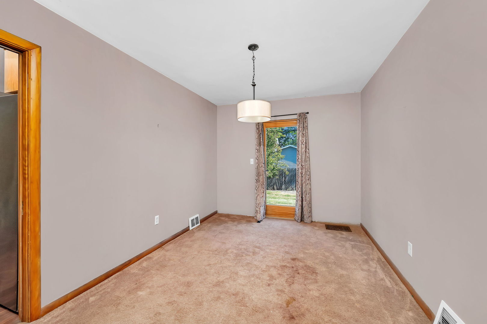 536 Fort Street Ottawa, IL 61350 - Photo 8 of 30 a view of an empty room with a window