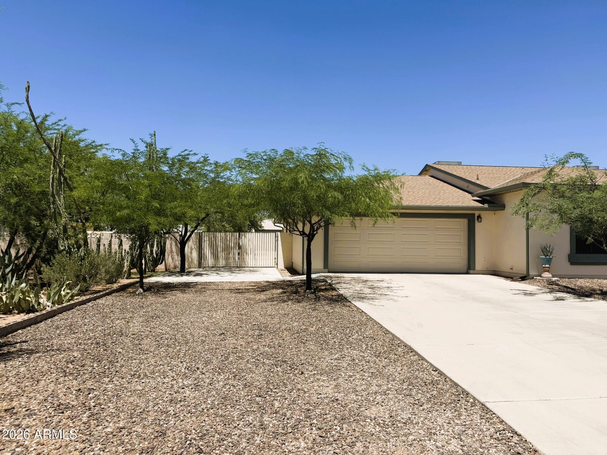 6334 East Albany Street Mesa, AZ 85205 - Photo 6 of 72 front view of a house with a street