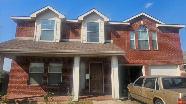 a front view of residential houses